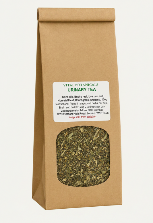 Brown paper bag of Vital Botanicals Urinary Tea with tea leaves visible on a white background